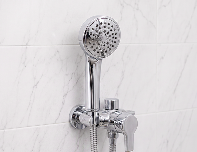 Shower fixture before limescale cleaning